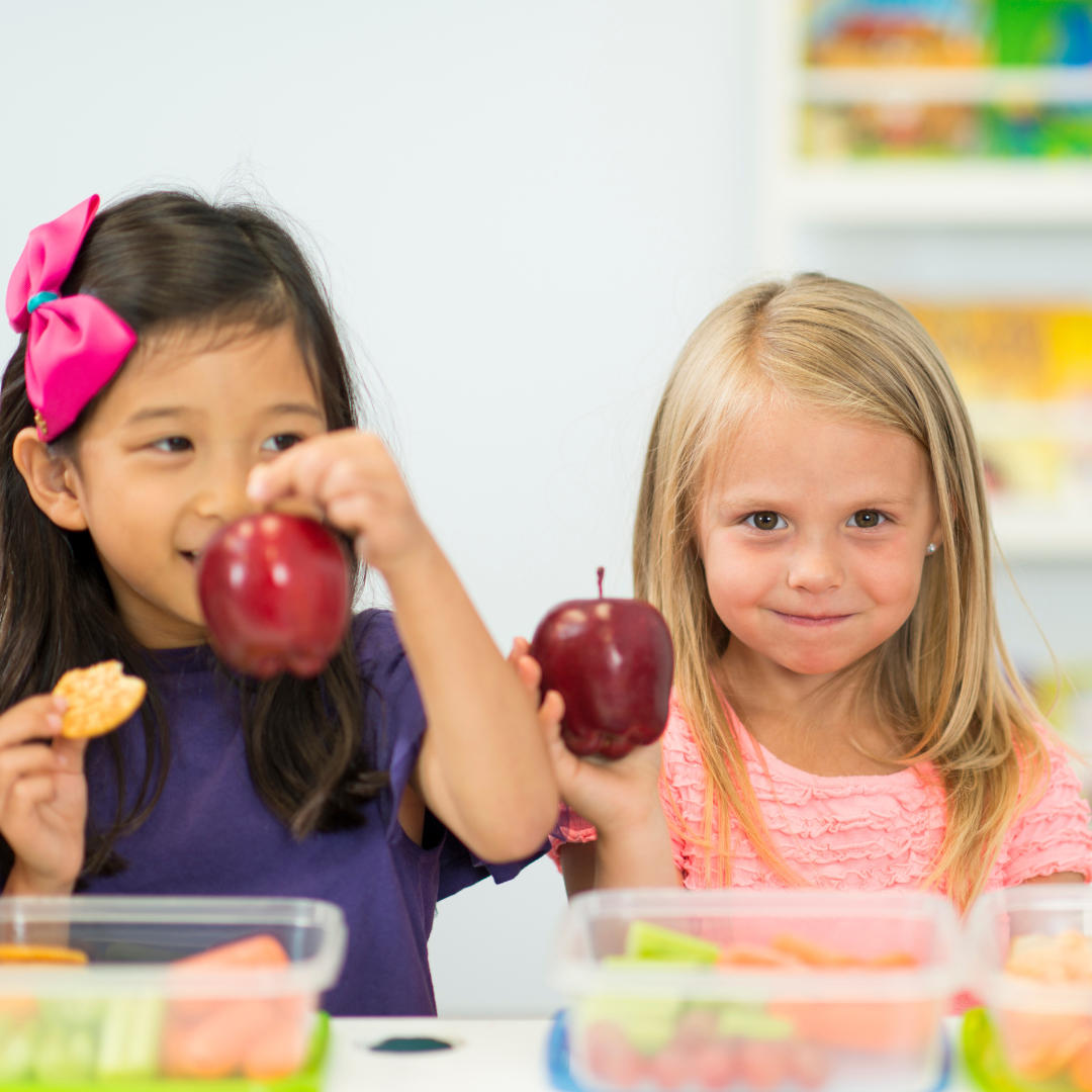 Preschoolers having a snack