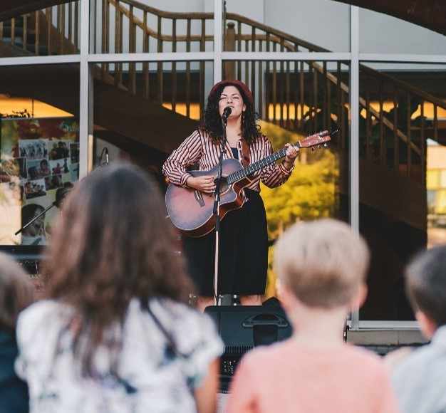 Sophie d'Orleans performing at an outdoor venue